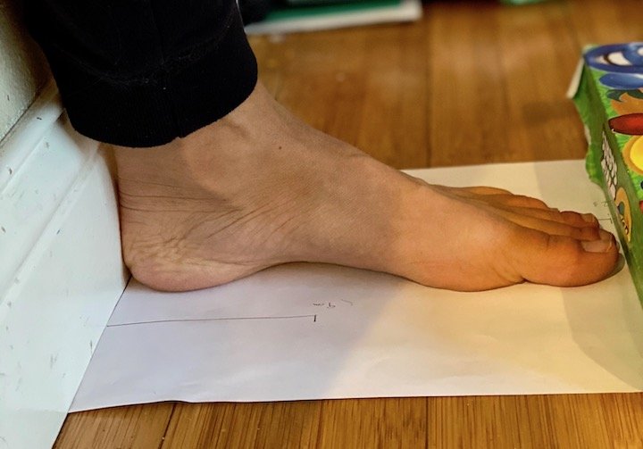 Measure foot by a wall - the wall technique